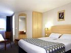 фото отеля Kyriad Saint Quentin En Yvelines Hotel Plaisir