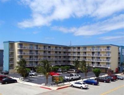 фото отеля Coastal Palms Inn and Suites
