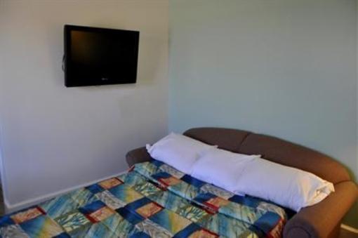 фото отеля Coastal Palms Inn and Suites