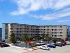 фото отеля Coastal Palms Inn and Suites