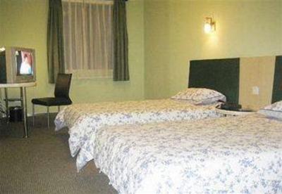 фото отеля Motel168 Shen Zhen Luo Fang Inn Shenzhen