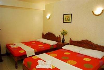 фото отеля D' Lucky Garden Inn & Apartelles Palawan