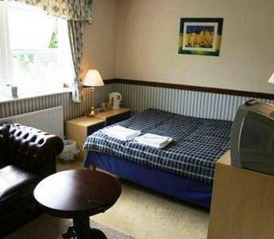 фото отеля Arnies Guest House
