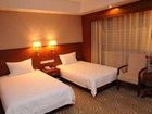 фото отеля Guanglian Business Hotel Haoxing Road