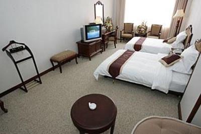 фото отеля Plateau Pearl Grand Hotel Kunming