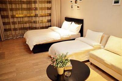 фото отеля Hangzhou C&Q Residence Xingguang Branch