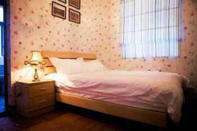 фото отеля Yijiuyisu Hostel