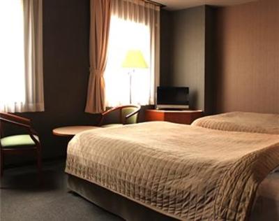 фото отеля Hotel Livemax Hiratsuka Ekimae