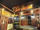 фото отеля Lijiang Bicycle and Sword Inn Treasure Courtyard
