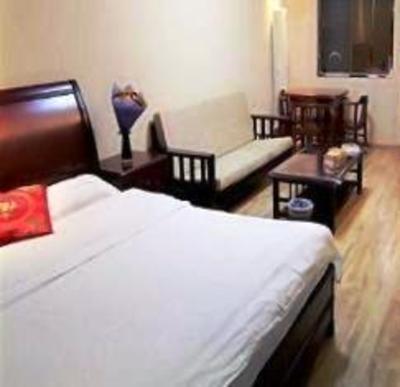 фото отеля Enji Apartment Hotel Dalian Yijinghuayuan
