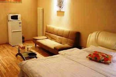 фото отеля Enji Apartment Hotel Dalian Yijinghuayuan