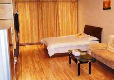 фото отеля Enji Apartment Hotel Dalian Yijinghuayuan