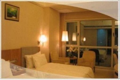 фото отеля Xinshikong Conifer Hotel