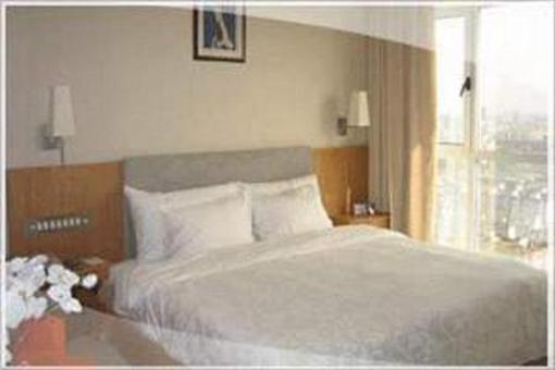 фото отеля Xinshikong Conifer Hotel