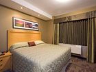 фото отеля Woodlands Inn & Suites