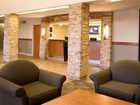 фото отеля Woodlands Inn & Suites