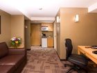 фото отеля Woodlands Inn & Suites