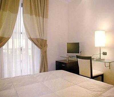 фото отеля The Strand Hotel Rome