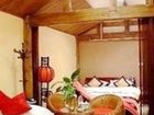 фото отеля Lazy Sun Inn Lijiang