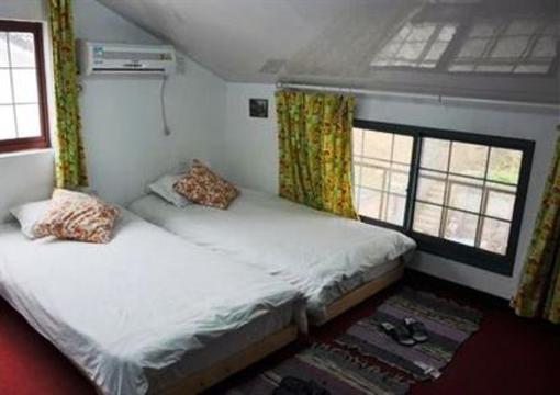 фото отеля Spring Flower Hostel & Cafe