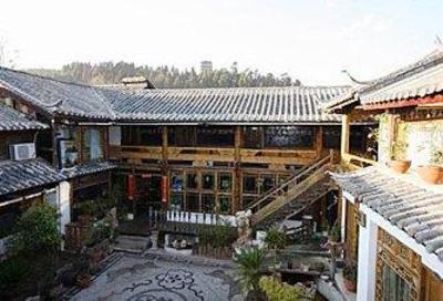 фото отеля Zhongyi Inn Lijiang Xiangshuyuan Courtyard Hotel