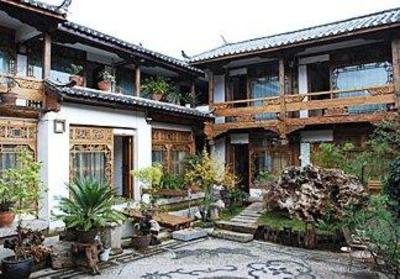 фото отеля Zhongyi Inn Lijiang Xiangshuyuan Courtyard Hotel