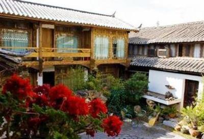 фото отеля Zhongyi Inn Lijiang Xiangshuyuan Courtyard Hotel