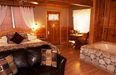 фото отеля Sleepy Forest Cottages