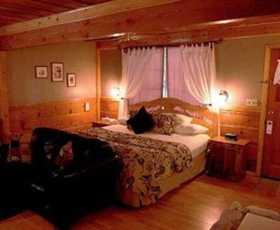 фото отеля Sleepy Forest Cottages