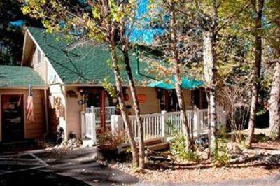 фото отеля Sleepy Forest Cottages