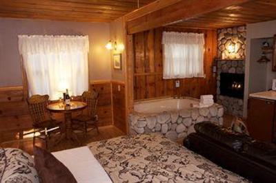 фото отеля Sleepy Forest Cottages