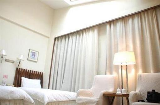 фото отеля Linyi Moon City Inn