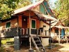 фото отеля Leela Beach Bungalows