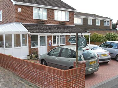 фото отеля Leeward House B&B