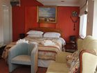 фото отеля Leeward House B&B