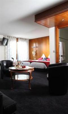 фото отеля Hotel Au Nid De Cigognes Ostheim