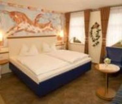 фото отеля Pension & Ferienwohnungen Topferstub'l Saalfeld