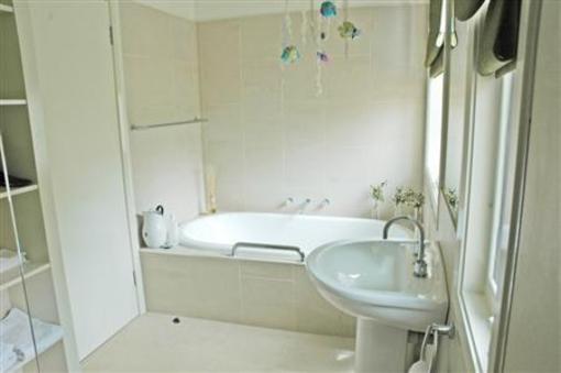 фото отеля Tuckpoint Cottage