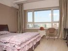 фото отеля Xinyue Apartment Hotel Shenyang