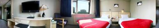 фото отеля Yuan Da Business Hotel Harbin