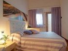 фото отеля Tre Merli Beach Hotel