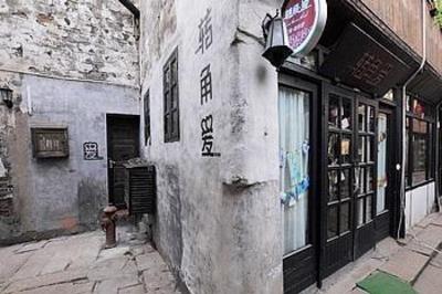 фото отеля Zhuanjiaoai Inn