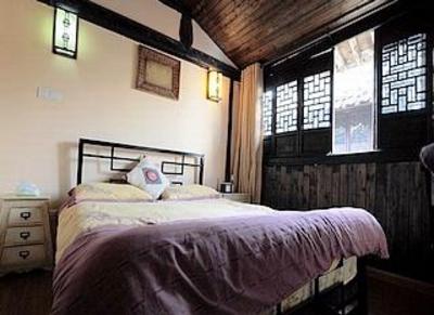 фото отеля Zhuanjiaoai Inn