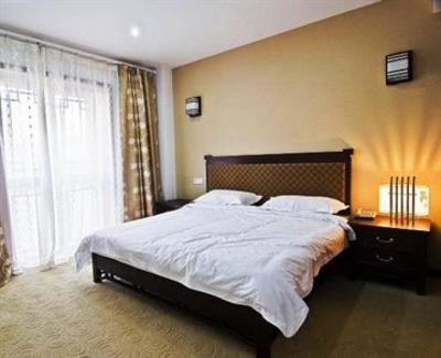 фото отеля Yinghua Apartment Hotel