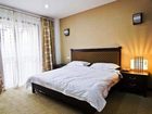 фото отеля Yinghua Apartment Hotel