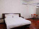 фото отеля Holiday Time Apartment Hotel Guanyin Bridge