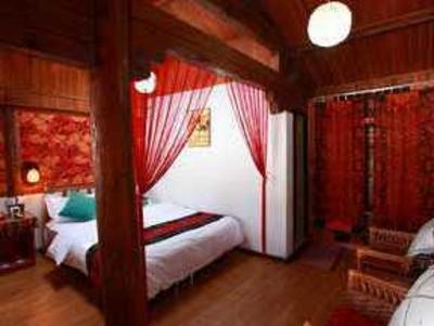 фото отеля Lijiang Paradise Bird Inn