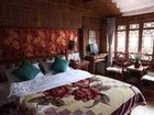 фото отеля Lijiang Paradise Bird Inn
