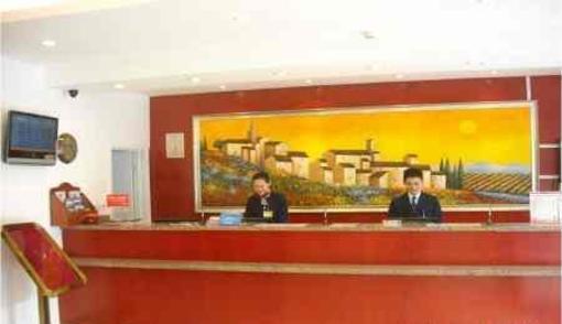 фото отеля Hanting Express Zaozhuang Junshan Road Triangle Garden