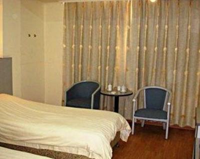 фото отеля Liangji Business Hotel